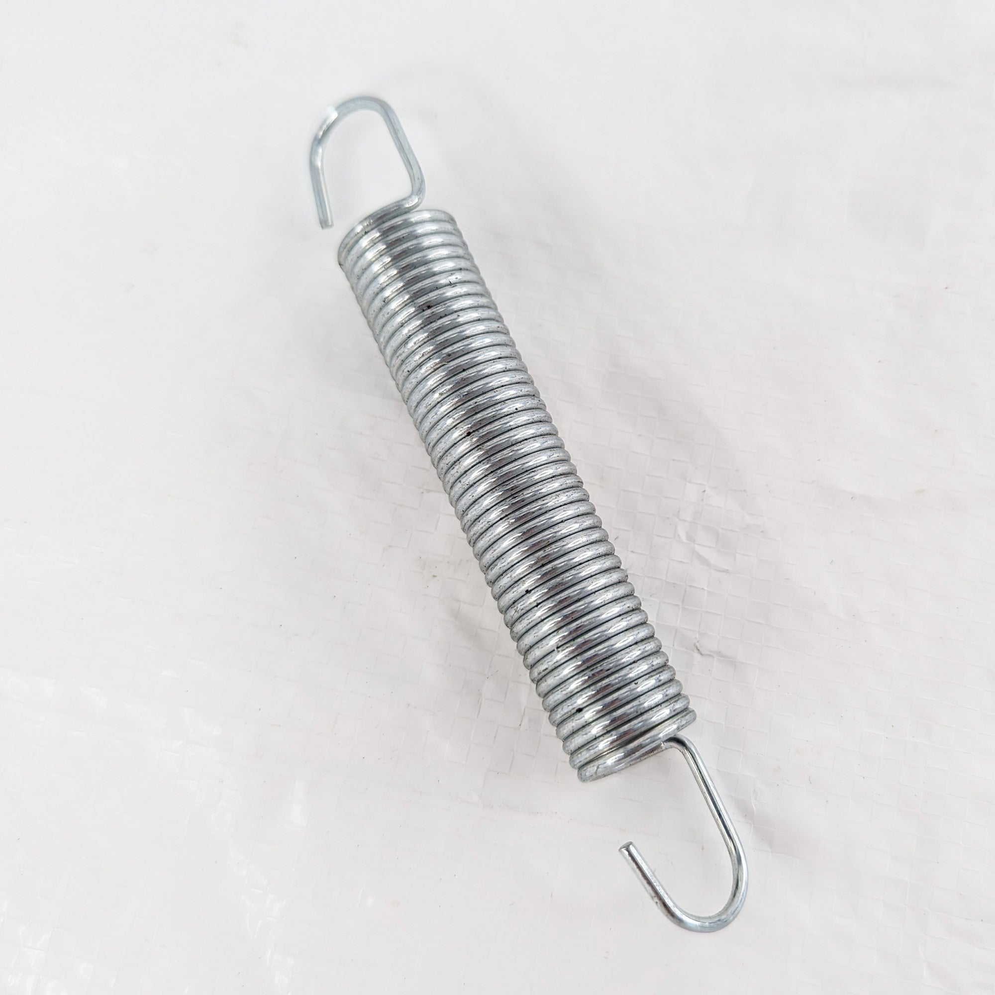 Lumilinko 7/10/13hv, voimapyörän palautusjousi