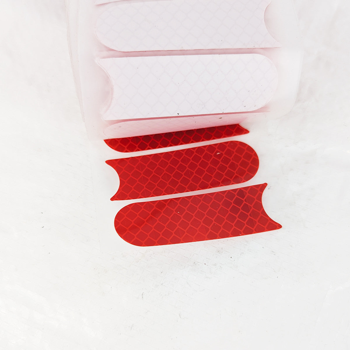 Sähköpotkulaudan heijastintarrat