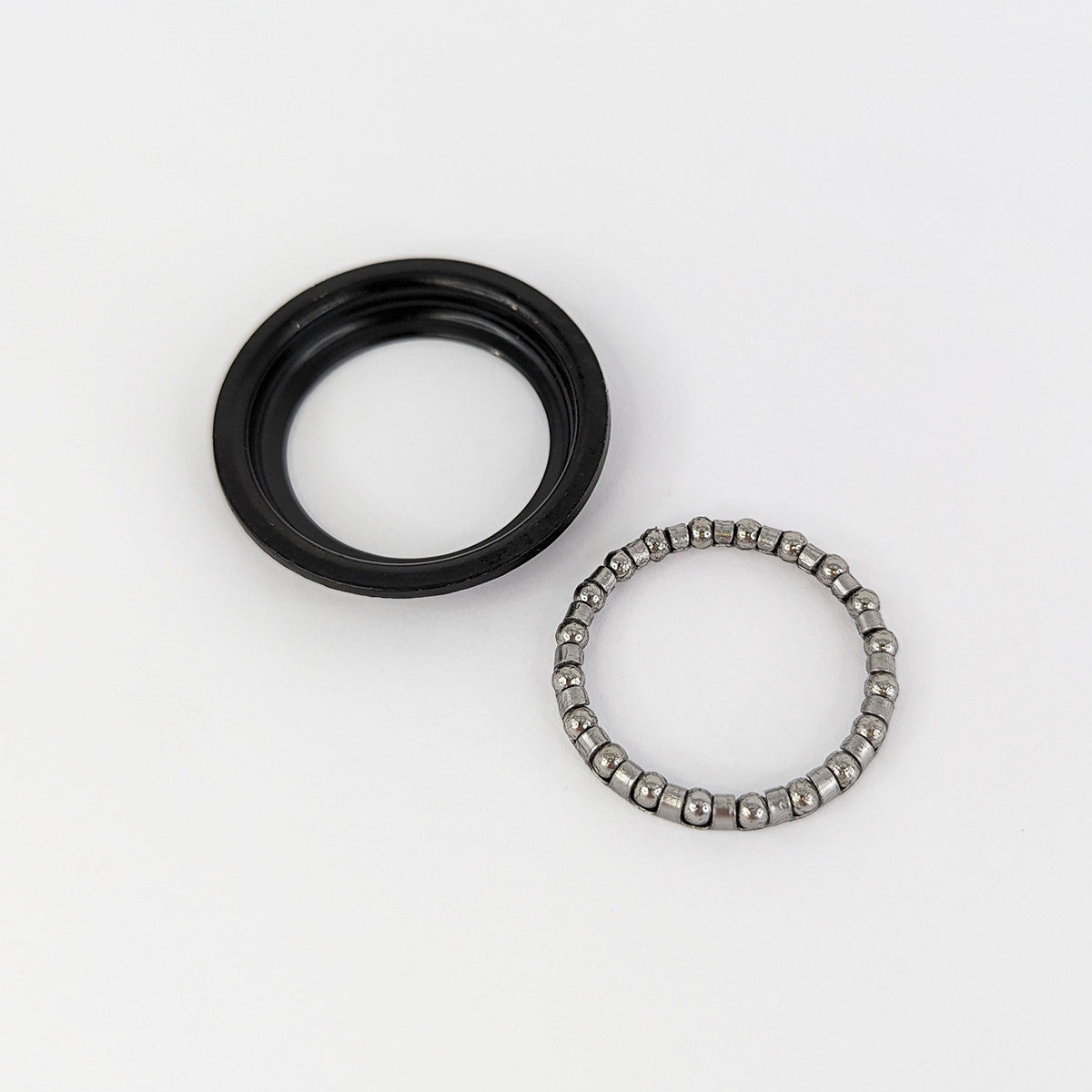 Sähköpotkulaudan ohjaustangon laakeri