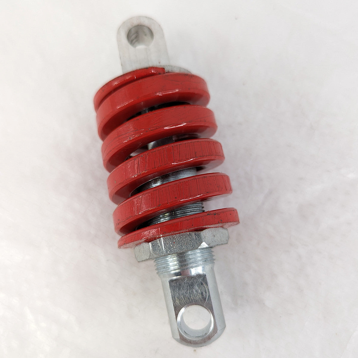 Sähköpotkulaudan jousi