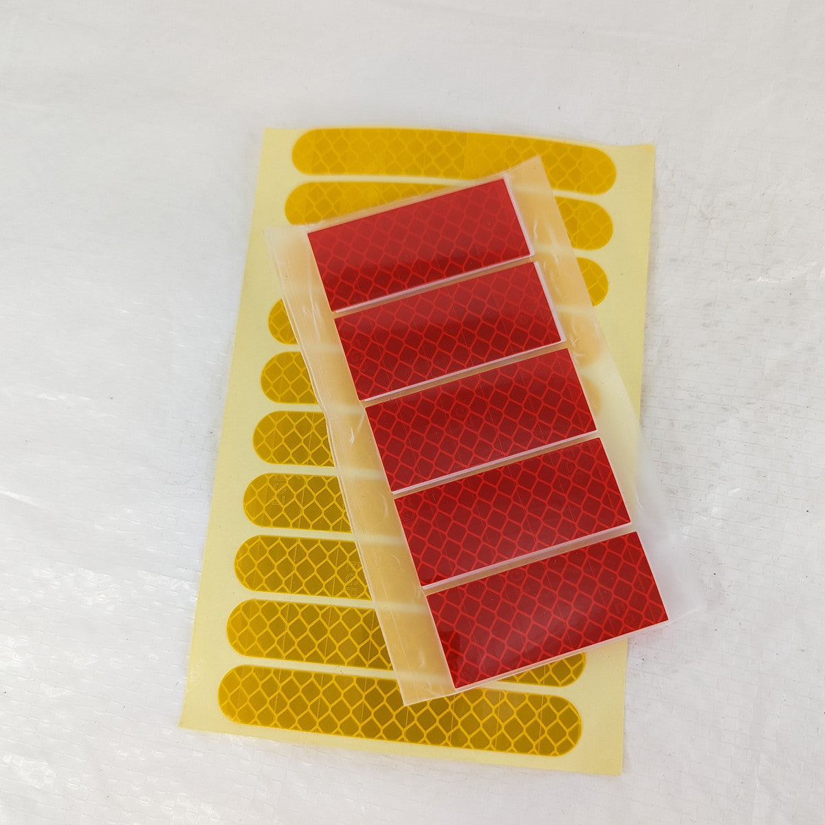 Sähköpotkulaudan heijastintarrat