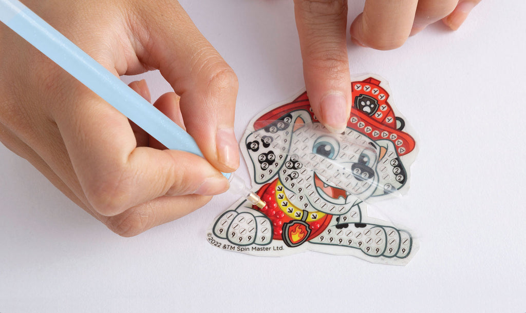 DOTZIES RYHMÄ HAU -TIMANTTIASKARTELU