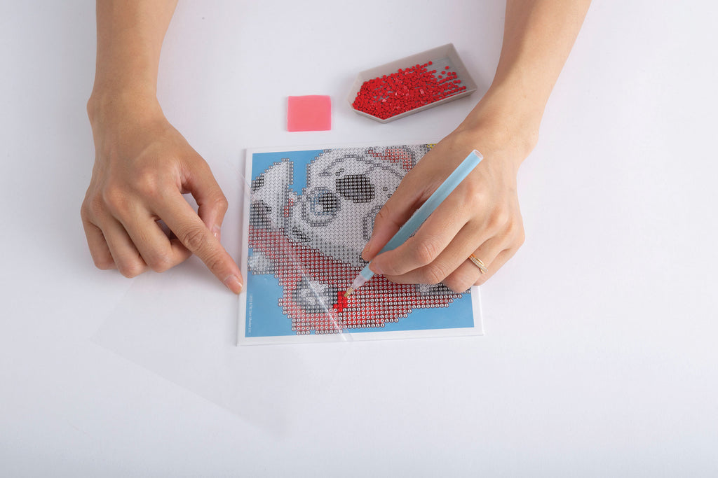 DOTZIES RYHMÄ HAU -TIMANTTIASKARTELU