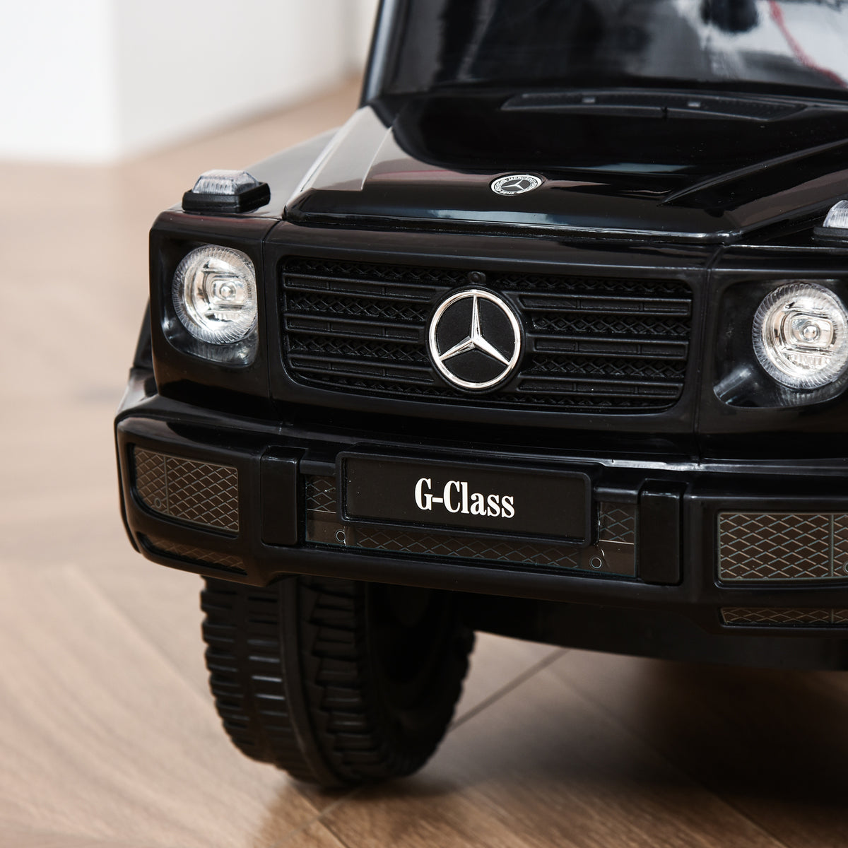 Lasten potkuauto työntötangolla Mercedes-Benz G350, 3-in-1, 12–36 kk, musta