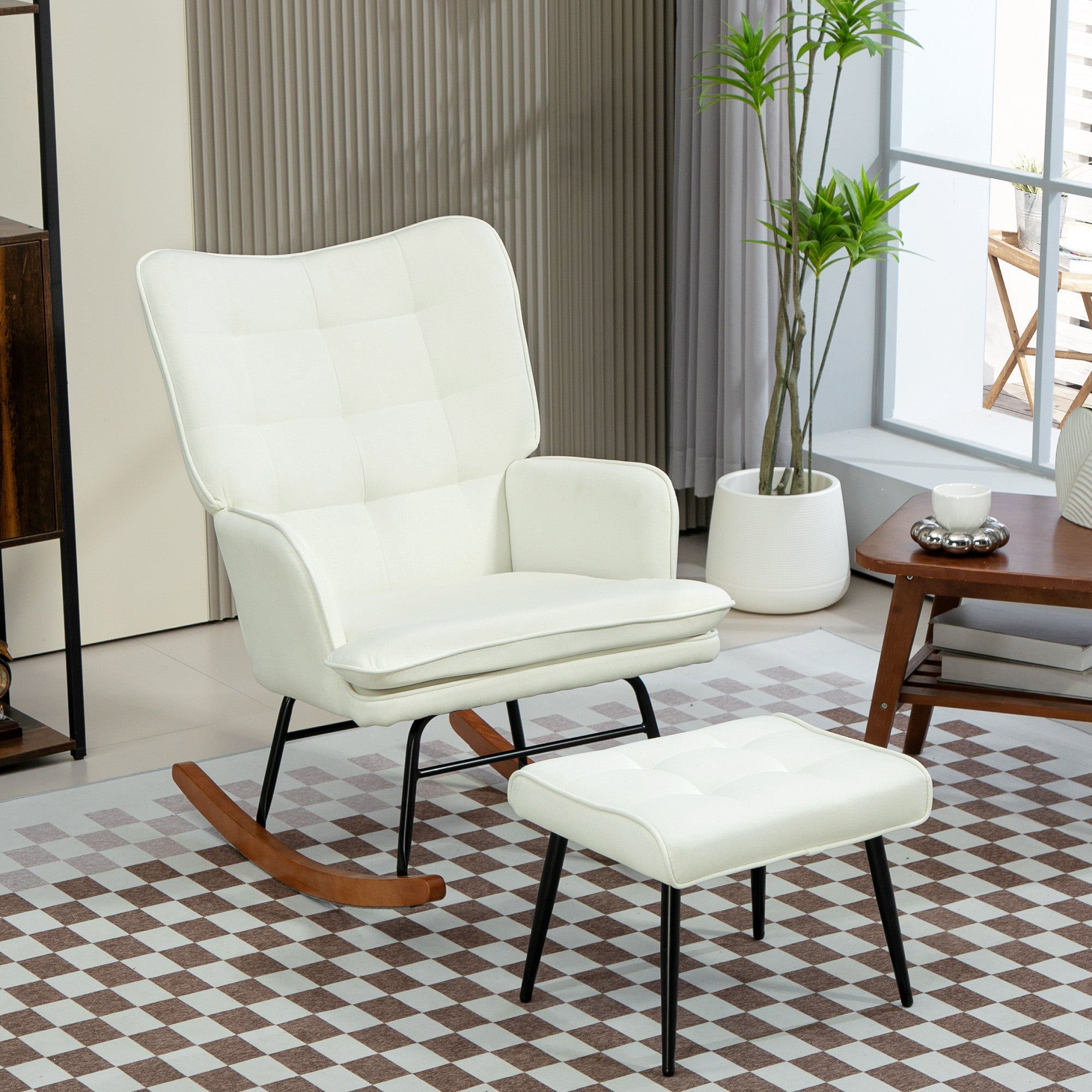 Keinutuoli ja rahi – valkoinen verhoiltu pyökkijalkainen nojatuoli rentoutumiseen