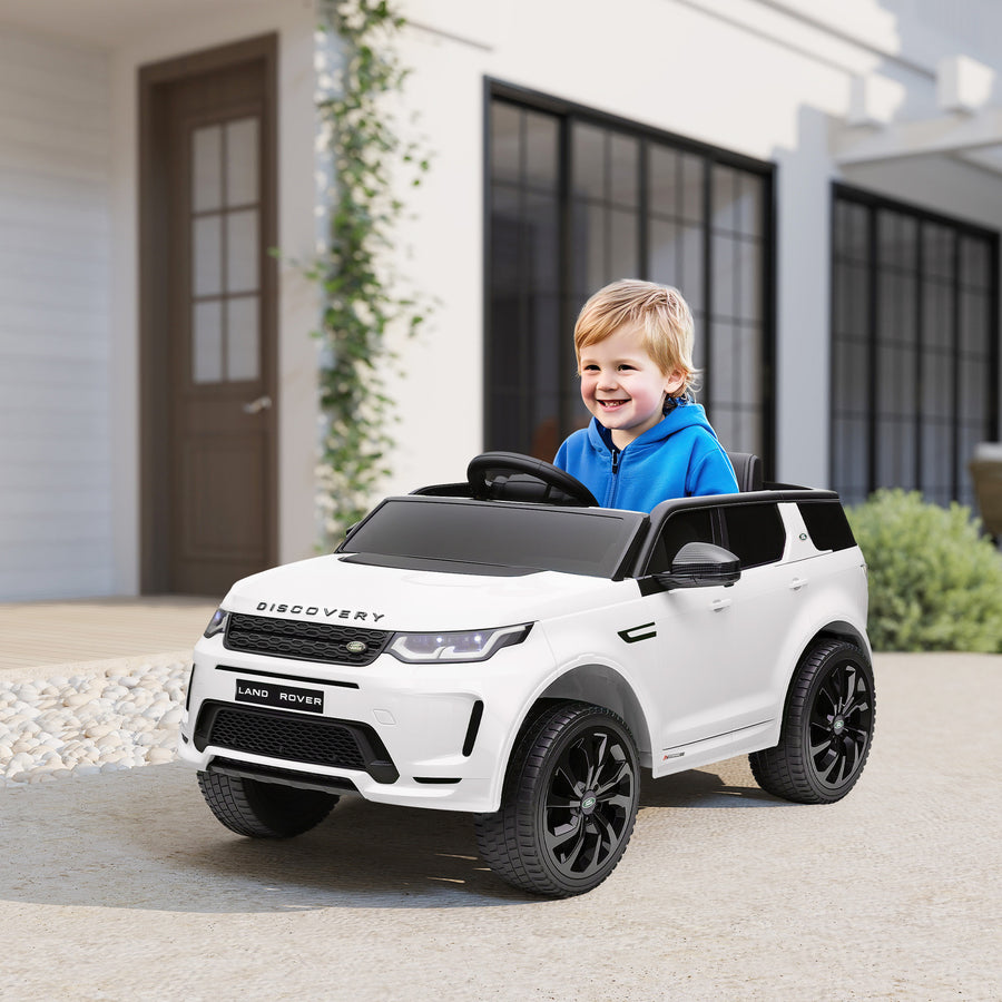 Land Rover Discovery Sport elbil för barn 12V – vit, fjärrstyrd, ljus och musik