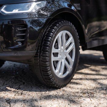 Lasten potkuauto Land Rover Discovery, äänitorvi ja moottoriäänet, säilytystila, 18–36 kk, musta